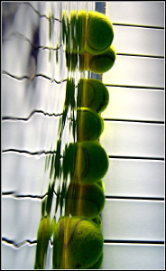 Photographed in the swimming pool-tennis balls by Veronika Matějková 